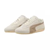 Championes Puma Speedcat Elevated color crema con detalles en marrón.