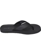 Ojotas negras Tommy Hilfiger con tira ancha de poliuretano acolchada y suela de goma EVA. Detalle de cinta distintiva con los colores de la marca en la tira.