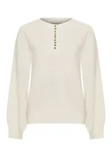 Sweater color crudo de lana con cuello redondo y abertura frontal con botones de madera.