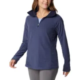 Buzo polar blanco de mujer, con cuello alto y cierre de media cremallera.