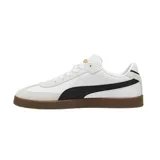 Championes Puma Club LI Era de cuero sintético negro con detalles en amarillo y suela color caramelo.