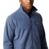 Campera polar Columbia Fast Trek II Fleece color celeste, con cierre frontal, cuello alto, bolsillos laterales con cierre y bolsillo en el pecho con cierre.