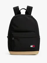 Mochila Tommy Jeans Essential negra con base color beige. Tiene un compartimento principal con bolsillo interior de malla, un bolsillo exterior con cremallera, asa superior y correas ajustables y acolchadas.