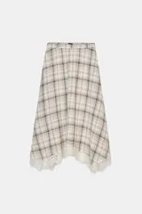 Falda midi de tiro alto con estampado a cuadros en tonos beige, blanco, gris y marrón. El bajo es asimétrico y está acabado con un borde de encaje blanco a tono.