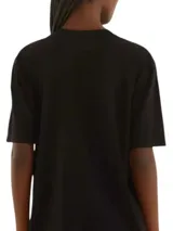 Camiseta negra de algodón con estampado de la cara de un jaguar y el logo de la marca Farm Rio.