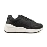 Zapatillas deportivas negras con suela blanca gruesa y diseño geométrico.