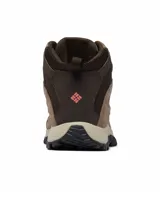 Bota de senderismo para mujer marca Columbia, modelo Crestwood Mid WTPF en color marrón con detalles en rosado. Cuenta con empeine de cuero y malla impermeable, tecnología Omni-Tech para mayor protección contra el agua, entresuela TechLite que ofrece amortiguación y suela Omni-Grip para tracción en diversos terrenos.