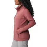 Polar de mujer color salmón, con tecnología Omni-Wick, estiramiento de confort, bolsillos con cremallera y agujeros para el pulgar.