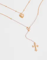 Collar corto doble dorado, con cadena de esferas, dije de corazón y dije de cruz con strass.
