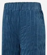 Pantalón wide leg azul con cintura elástica y textura de malla.