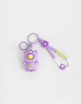 Llavero con dije de osito lila con un patito de goma en su capucha y llavero con dije de flor lila y strap de silicona con la inscripción "Luck Day".
