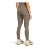 Calza deportiva color salmón, tiro alto, corte capri y bolsillo lateral.