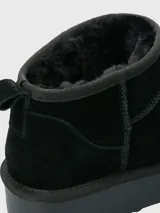 Bota corta color marrón claro de cuero con plataforma y forro de poliéster.