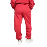 Pantalón de jogging rojo con cintura elástica y cordón ajustable. Presenta el logo de Umbro y el escudo del Club Nacional de Football bordados en los muslos.