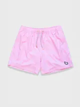 Short de baño rosado con estampado de lunares blancos, cintura elástica con cordón ajustable, bolsillos laterales y trasero con cierre, y suspensor de malla fina hipoalergénica.