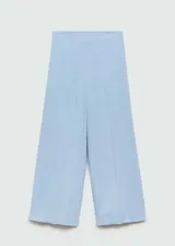 Pantalón culotte color beige de lino y viscosa, con cintura elástica y corte ancho.