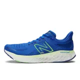 Championes de running New Balance modelo 1080, color azul con detalles en verde y blanco. Cuentan con tecnología Fresh Foam X en la entresuela y empeine Hypoknit.