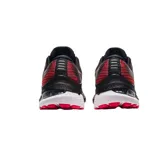 Championes de running Asics Gel-Kayano 28, color negro con detalles en rojo.