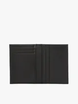 Billetera Tommy Hilfiger negra de piel con logo en relieve en el frente y múltiples ranuras interiores para tarjetas.