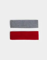 Set de dos vinchas elásticas de punto acanalado, una gris y otra roja.