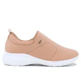 Championes deportivos casuales Usaflex Larisa color piel con suela blanca.