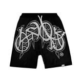 Bermuda tejida negra con estampado abstracto en blanco y gris. Tiene cordón ajustable en la cintura y corte oversize.