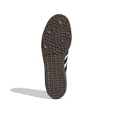 Championes Adidas Samba OG, color blanco con detalles en negro y gris. Diseño clásico de cuero con las tres tiras laterales en contraste y suela de goma marrón.