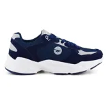 Championes Hi-Tec Harlan para hombre, color azul marino con detalles en gris y blanco. Zapatillas deportivas con suela gruesa blanca y logo de la marca en el lateral.