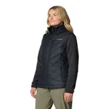 Chaleco acolchado Columbia Heavenly II para mujer, color negro, con forro termorreflectante Omni-Heat™, cuello de felpa forrado de vellón, cierre frontal de dos vías, bolsillos laterales con cremallera y bolsillo interior de seguridad.