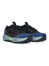 Championes Under Armour Fat Tire Venture Pro, color negro con detalles en azul y verde. Inspirados en bicicletas Fat Tire, con suela de goma resistente y amortiguación UA HOVR.