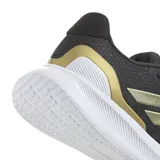 Championes Adidas Runfalcon 5 de running, color negro con detalles dorados y suela blanca.