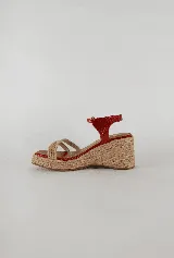 Sandalias de cuero color rojo con plataforma de yute y tira doble de yute en la capellada.