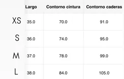 Minifalda negra con bordado de lentejuelas y mostacillas plateadas.
