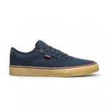 Championes Etnies Blitz de lona azul marino con logo de la marca en el lateral y suela de goma color caramelo.