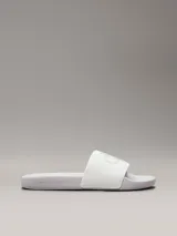 Chancletas blancas Calvin Klein Jeans con logo en relieve en la tira y plantilla texturizada.