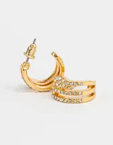 Aros dorados tipo argolla con forma de serpiente y strass incrustados.