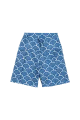 Short biker azul con estampado de ondas blancas, con bolsillo lateral, cintura alta y lycra ecofriendly con SPF 50.
