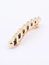 Broche dorado para el pelo con forma de eslabones.