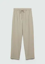 Pantalón fluido color beige, de corte recto y tiro alto, con cintura elástica y cordón ajustable. Presenta bolsillos laterales y diseño jogger.