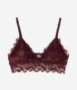 Soutien de encaje floral color crema, modelo top, con breteles finos ajustables y relleno triangular.