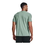 Camiseta de manga corta en color verde lima, con logotipo de Under Armour en el pecho izquierdo.
