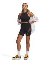 Musculosa deportiva negra con cierre frontal y almohadillas removibles.