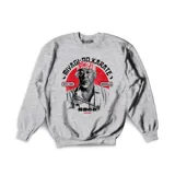 Buzo gris melange de algodón con estampa circular en el frente que incluye una foto de Mr. Miyagi, el texto "Miyagi-Do Karate", "Est. 1984" y "Reseda, CA".