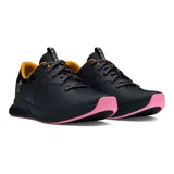 Championes de running Under Armour Charged Aurora, color negro con detalles estampados en azul y naranja, suela blanca y cordones moteados.