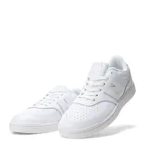 Championes New Balance modelo 080, color blanco, con logo "N" en los laterales y perforaciones en la puntera.