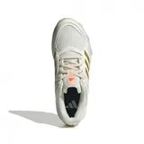 Championes Adidas Fabela Rise color crema con detalles dorados y suela color durazno, diseñados para hockey.