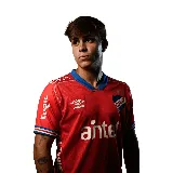 Camiseta de fútbol Umbro del Club Nacional de Football, modelo Away 1 2025. Diseño rojo con detalles en azul en cuello y mangas. Incluye logo de Umbro, escudo del club y sponsor Antel en el frente.