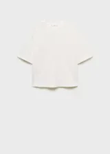 Camiseta oversize blanca de algodón con cuello redondo y mangas cortas.