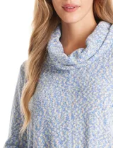 Buzo tejido con textura, color rosado y blanco, de la marca Ruby Rd. Presenta cuello volcado y mangas 3/4.