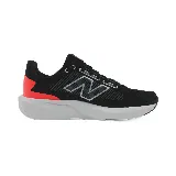 Championes de running New Balance, color negro con detalles en gris y naranja.